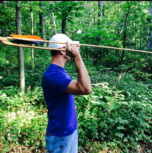Person using an Atlatl.