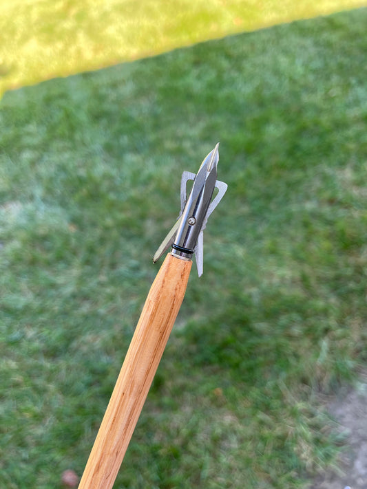 Atlatl dart with a archery broad head.